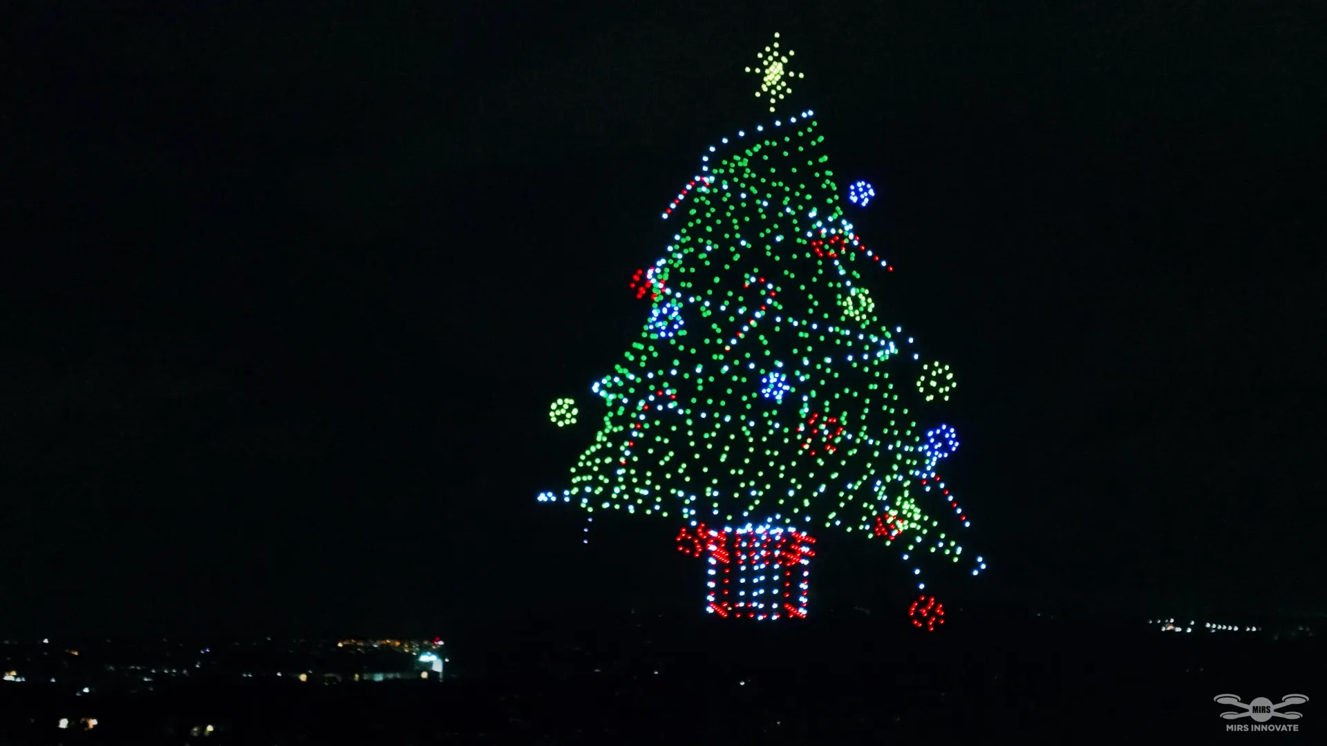 Christmas tree drone formation during Coca-Cola Christmas drone light show Philippines