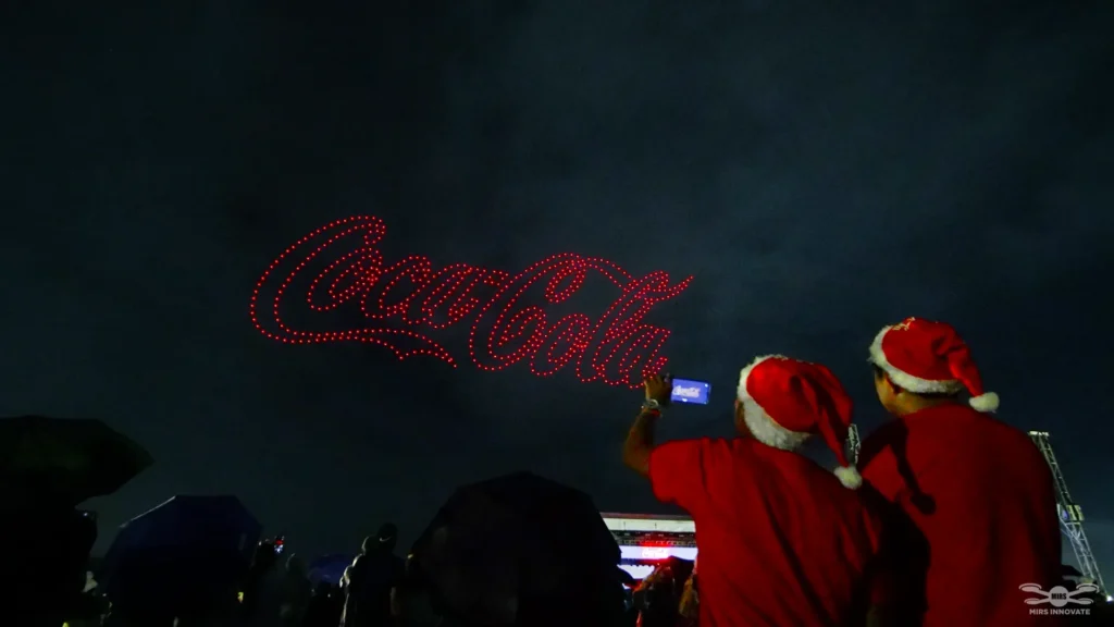 Coca-Cola logo drone formation above Nuvali at the Philippines Christmas drone show