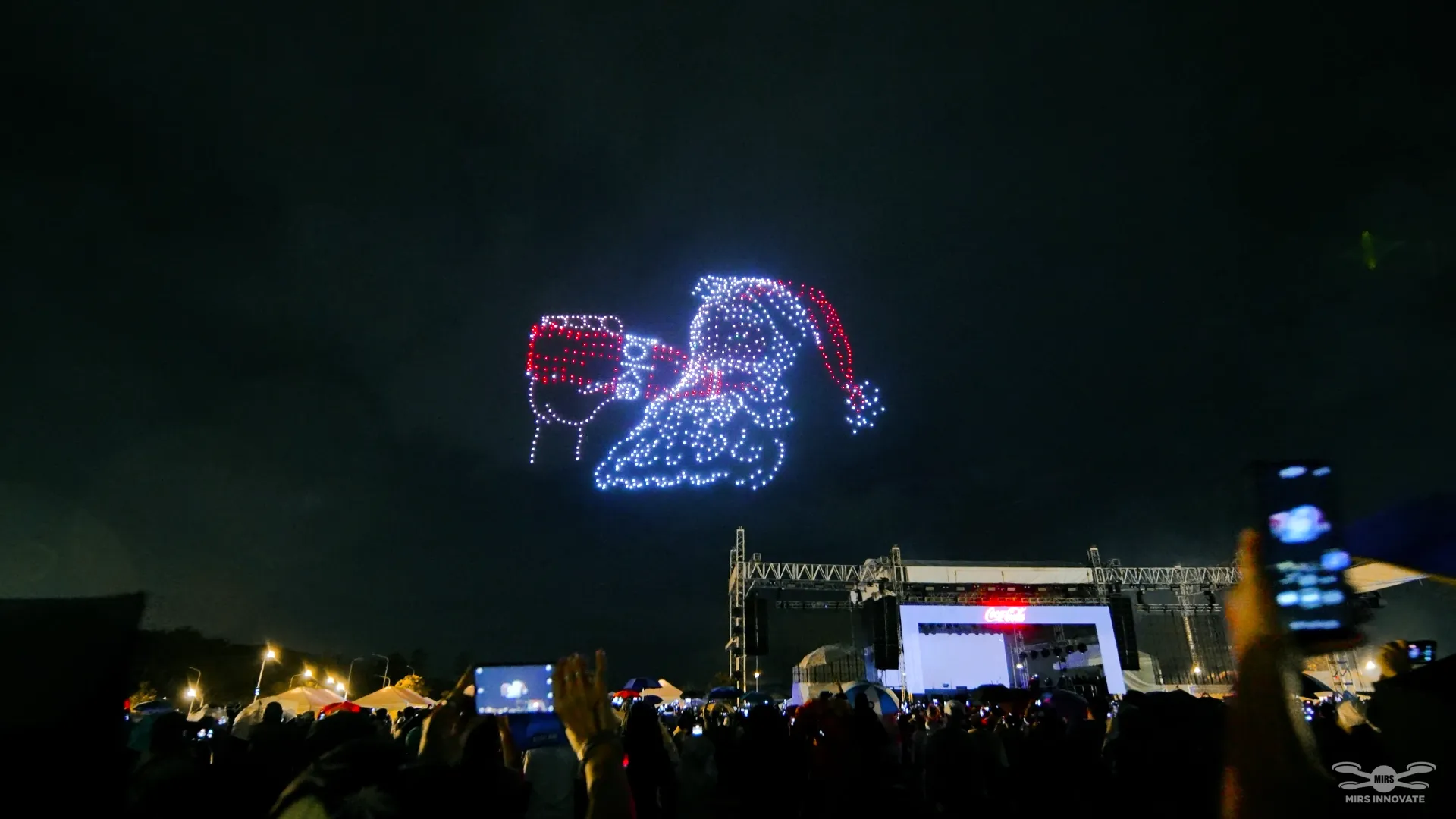 Santa Claus drinking Coca-Cola drone formation at Nuvali Christmas drone show Philippines