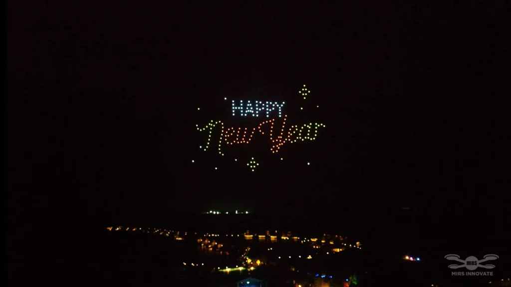 Happy New Year text drone formation at InterContinental Maldives Maamunagau drone show