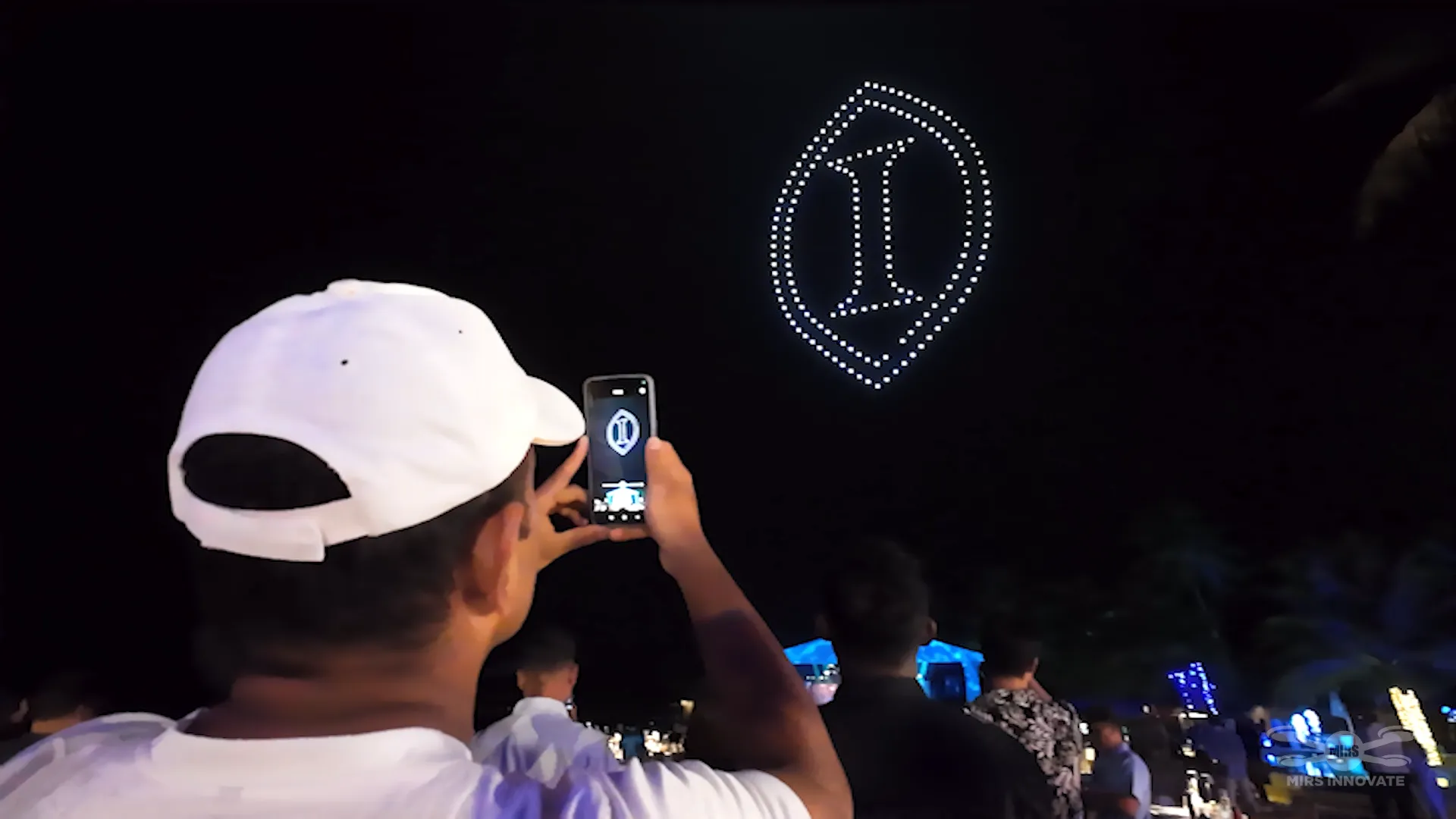 InterContinental logo formation displayed by drones over Maamunagau Resort Maldives