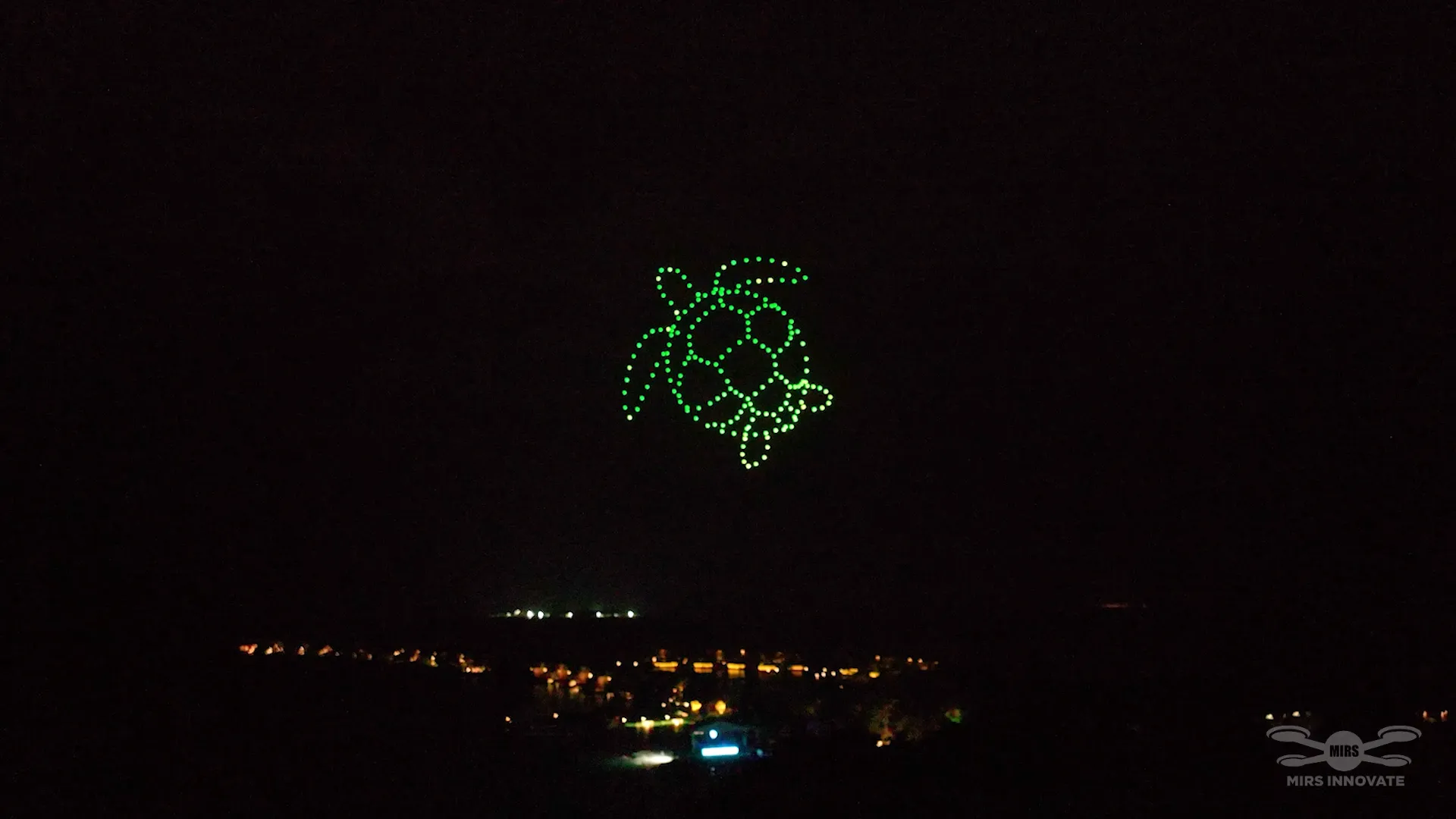 Sea turtle formation by drones over the ocean at InterContinental Maldives Maamunagau Resort