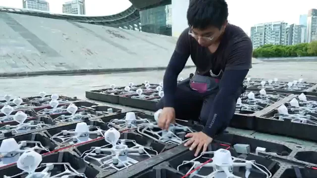 Ground crew in pre-show drone preparation — Socrates app launch drone light show, Sydney Harbour, Australia