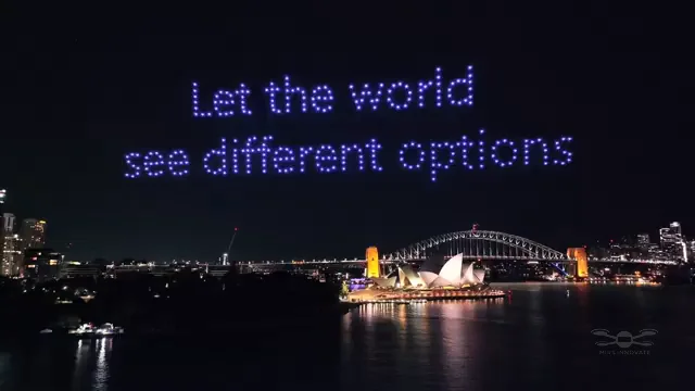 "Let the World See" text formation above Sydney Harbour — Socrates app launch drone light show, Sydney, Australia