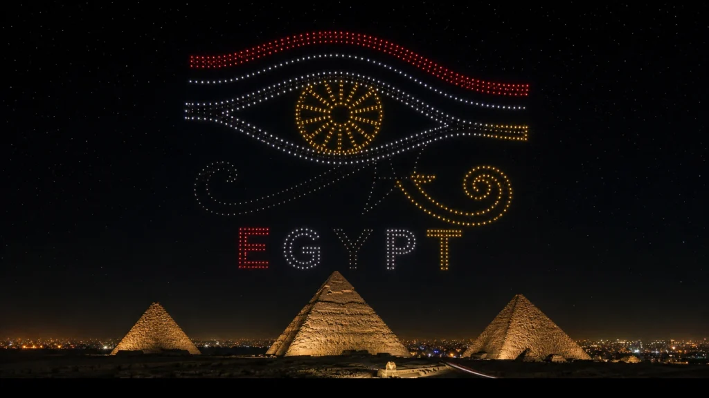 MIRS drone light show Egypt — crescent formation above Cairo skyline at night
