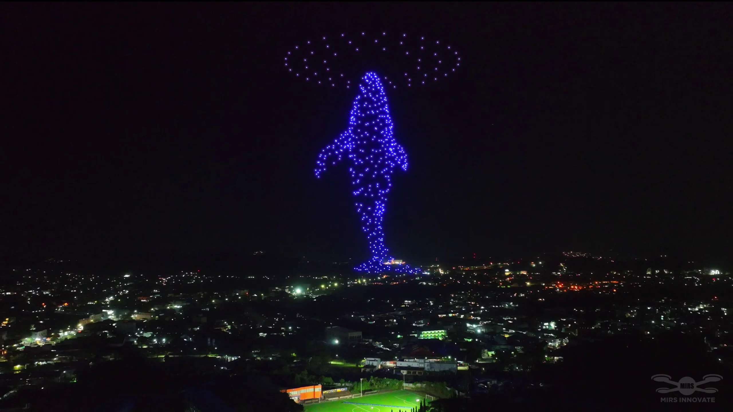 Minaret tower drone light formation above Samarinda Stadium — 500 drones honoring the Islamic cultural theme of the MTQN XXX national event