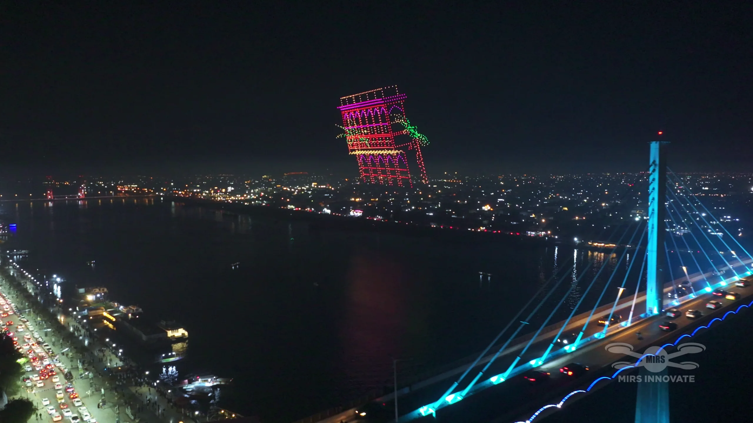 Dallah Arabic coffee pot formation at a government celebration drone light show in Basra, Iraq — 2,000 drones