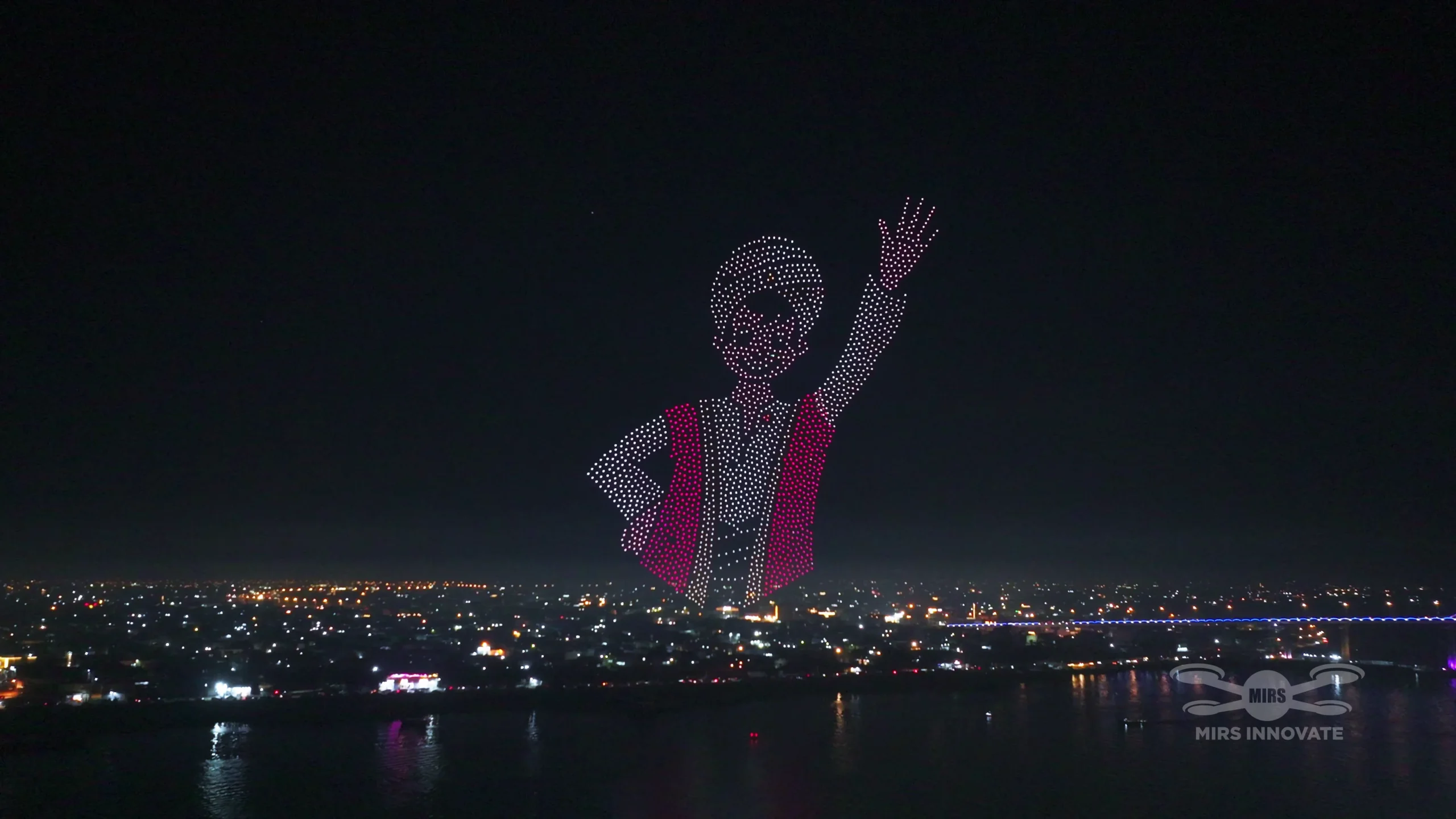 Iraqi woman dancer formation at a government celebration drone light show in Basra, Iraq — 2,000 drones