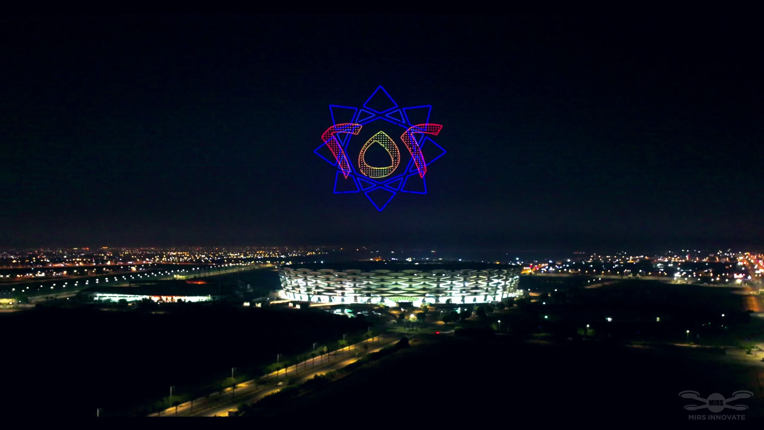 Decorative star emblem formation at a government celebration drone light show above Basra Stadium, Iraq — 2,000 drones