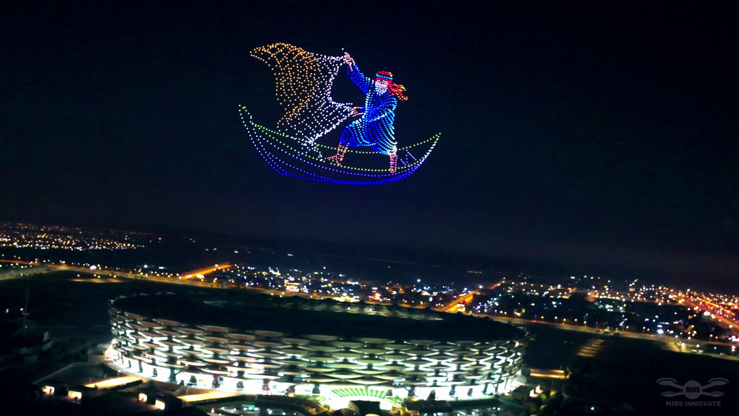 Sinbad the sailor boat formation at a government celebration drone light show above Basra Stadium, Iraq — 2,000 drones