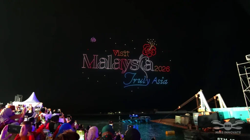 Visit Malaysia 2026 drone formation above a waterfront audience at World Tourism Day in Melaka