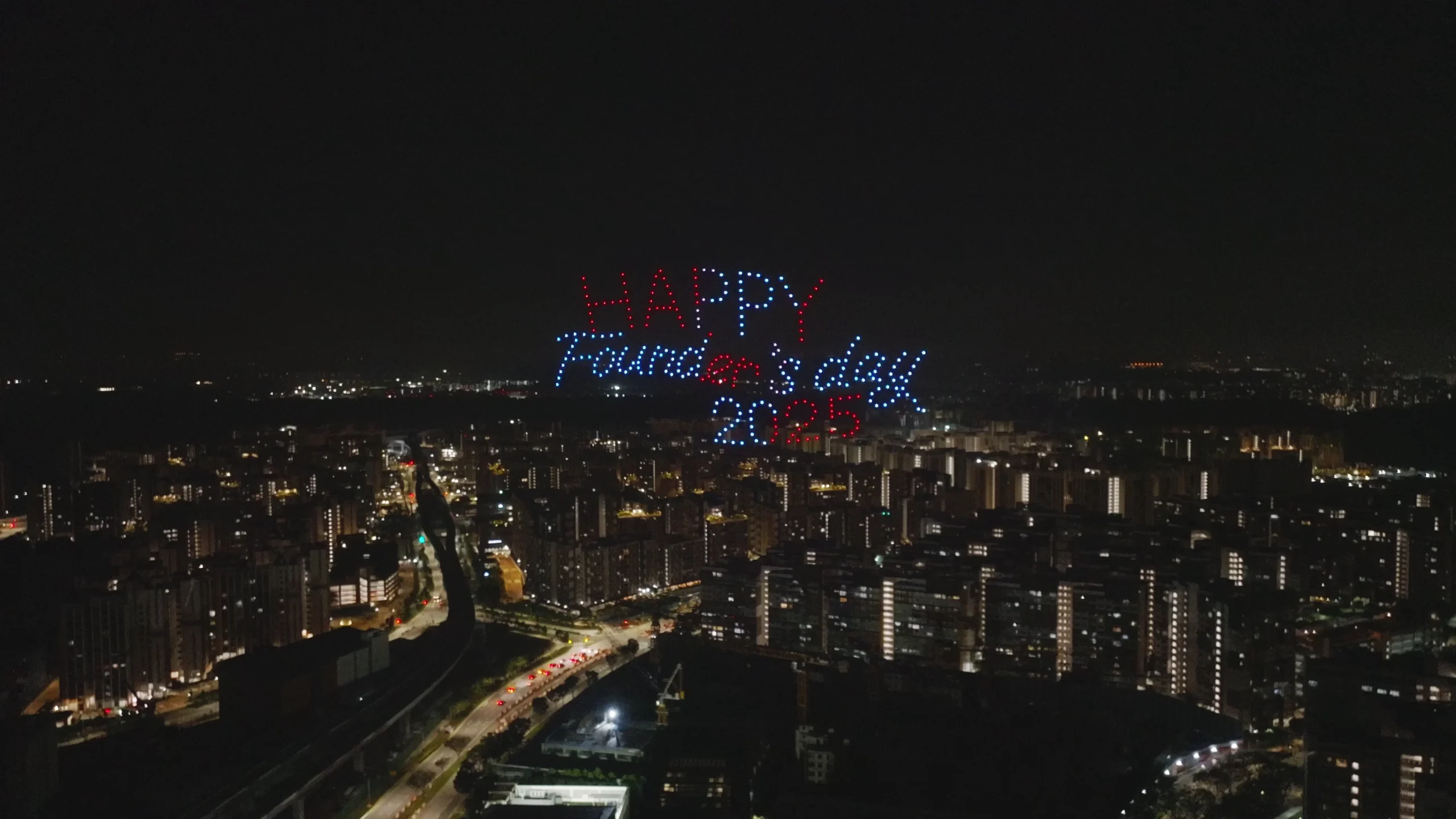 Happy Founder's Day 2025 drone formation above Dulwich College Singapore
