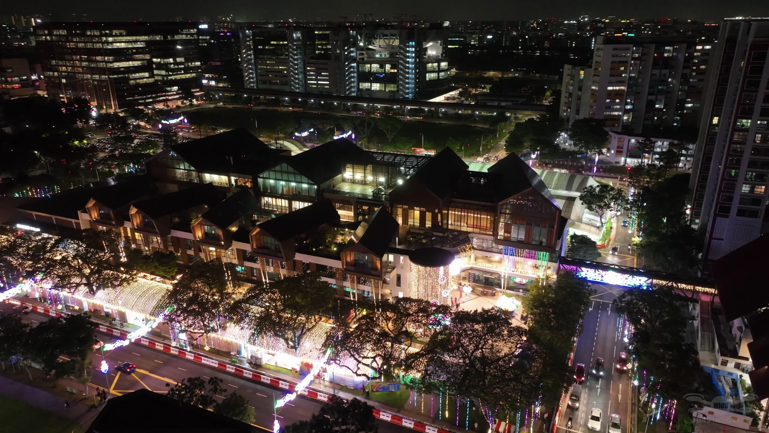 Aerial night view of Geylang Serai during the Bazaar Raya drone show