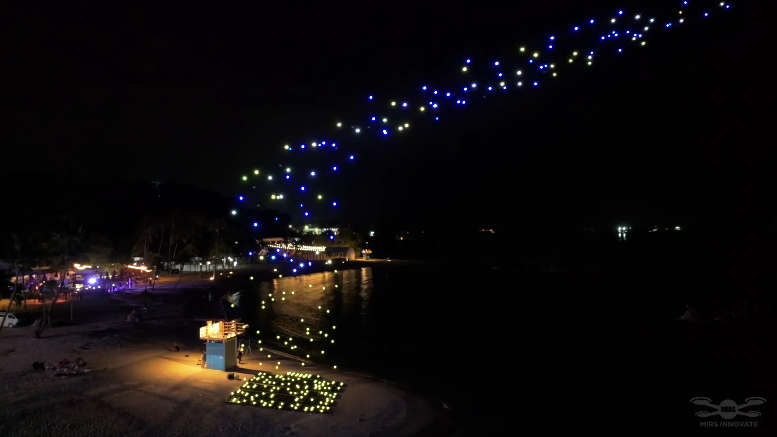 Drone swarm launching at Siloso Beach for the YuanYi 2025 Sentosa drone light show