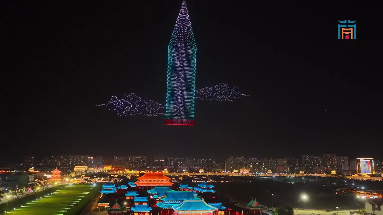 Skyscraper-style formation above a city skyline during the China National Day drone show