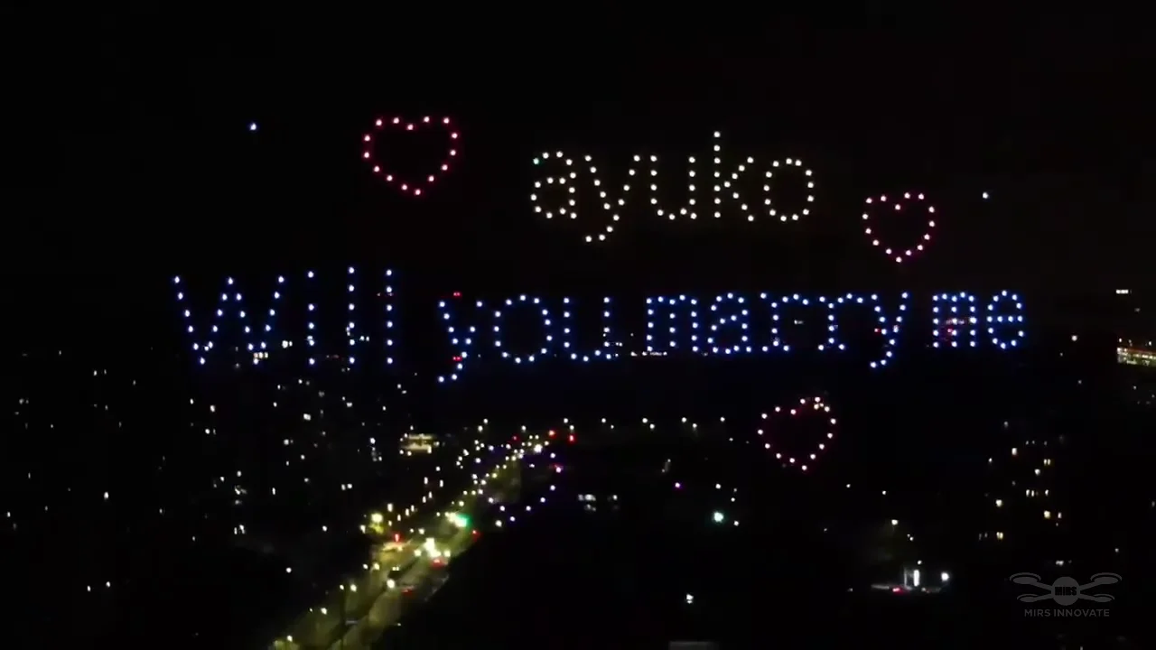 Will You Marry Me text and hearts closing the 300-drone proposal show