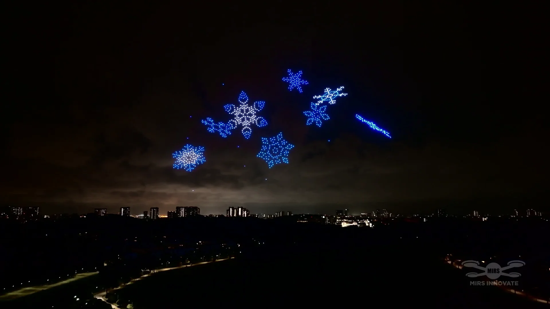 Snowflake drone formation at a Christmas light show in Singapore