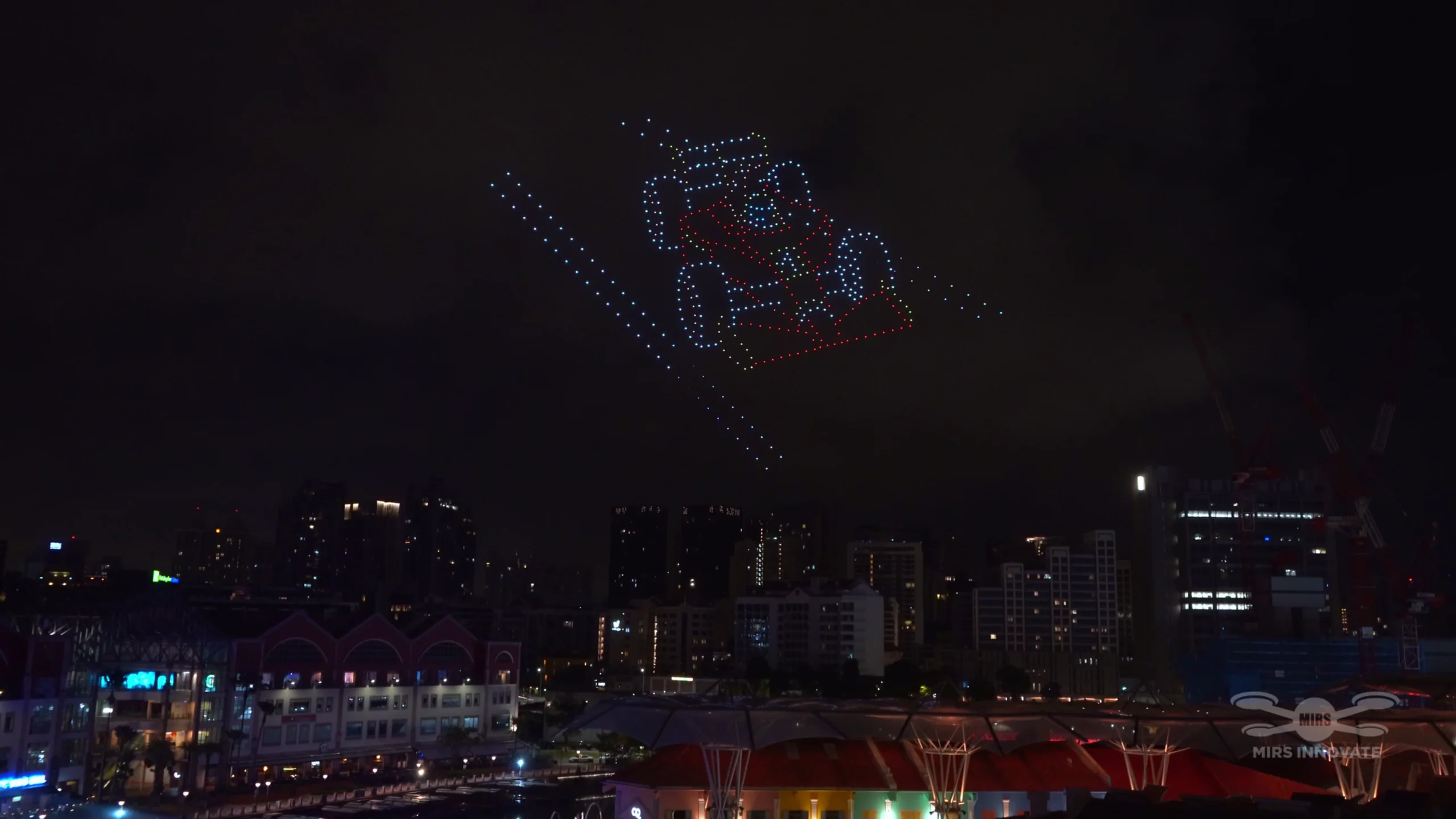 F1 car drone formation above Clarke Quay in Singapore