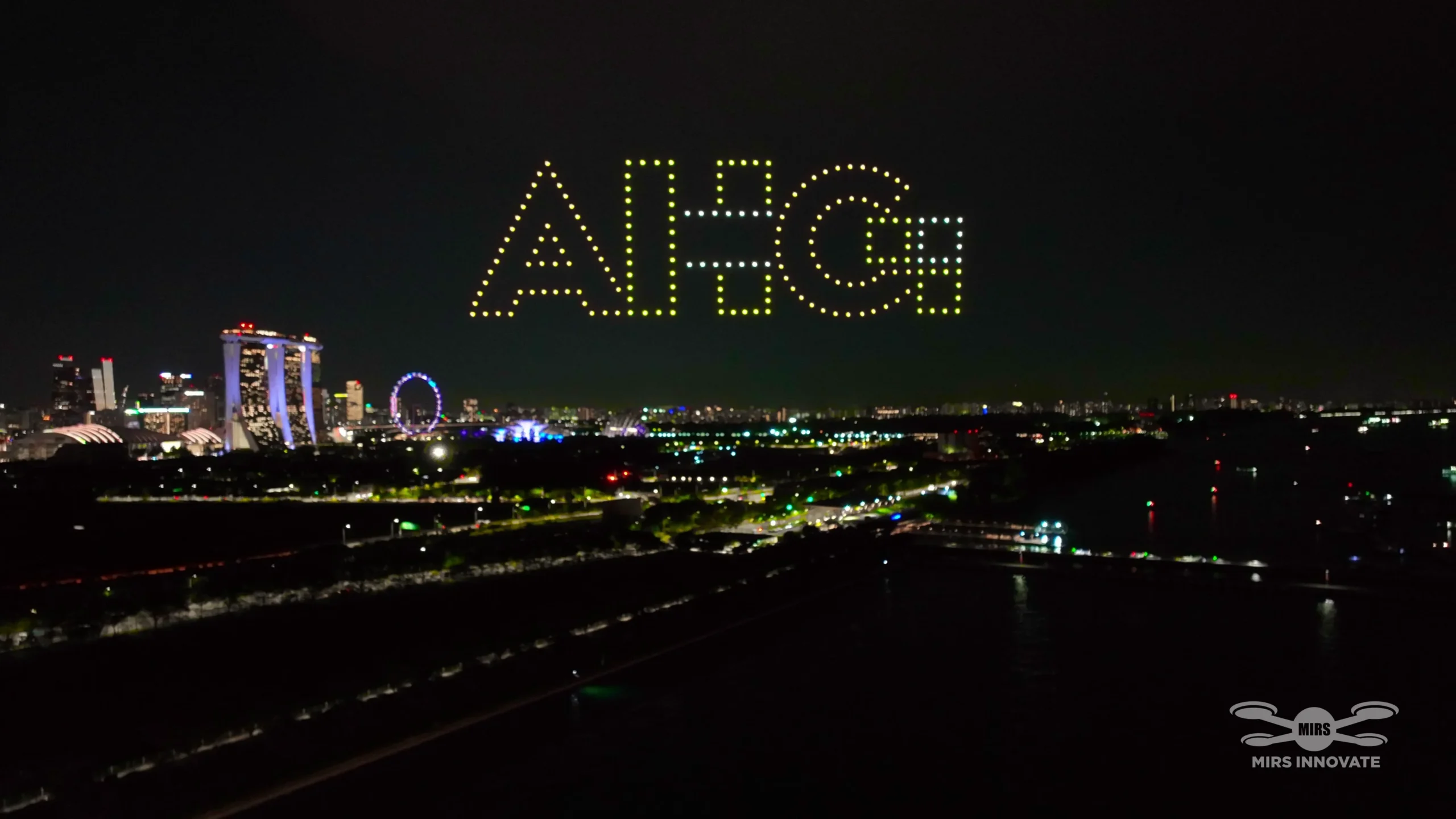 AAA Holding Group logo drone formation above Marina Bay in Singapore