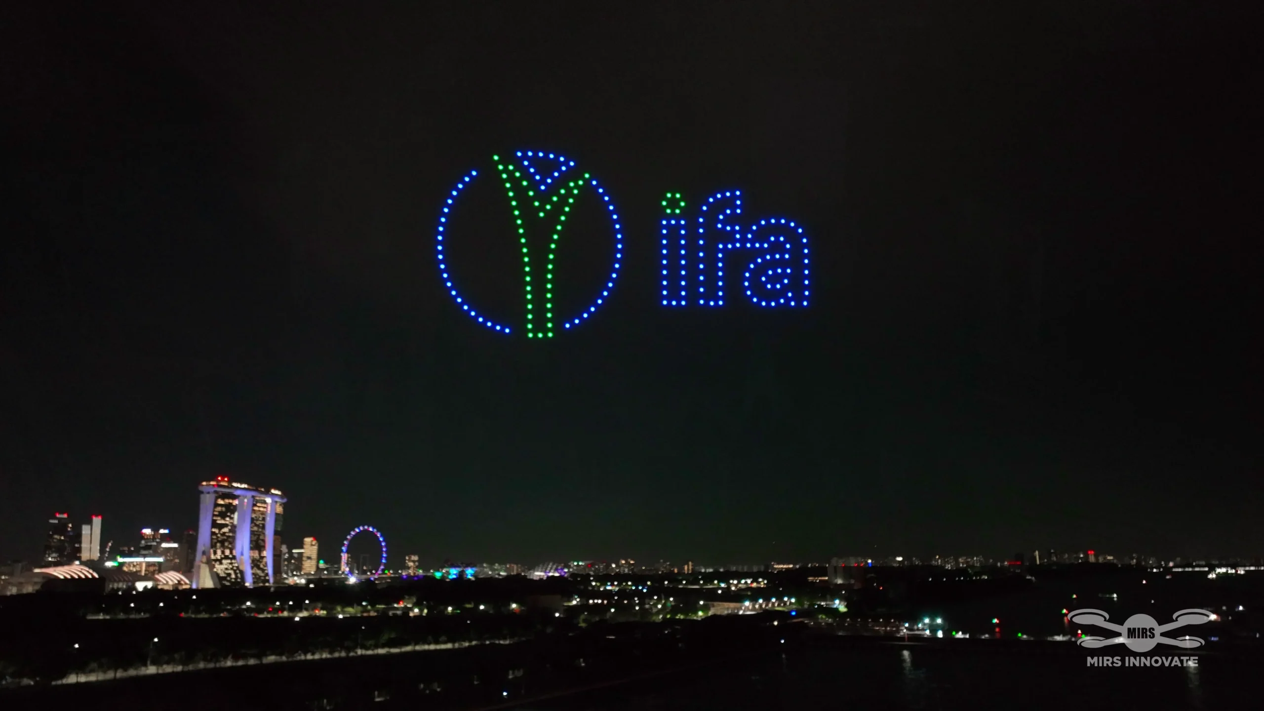 IFA logo drone formation above the Singapore skyline