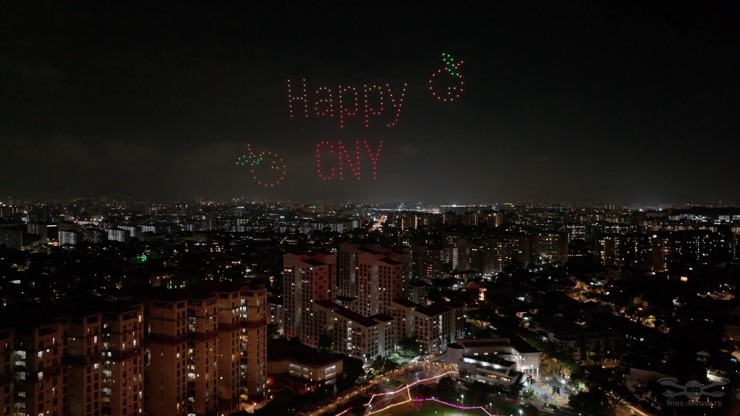 Happy CNY drone text above Kampong Kembangan CC in Singapore