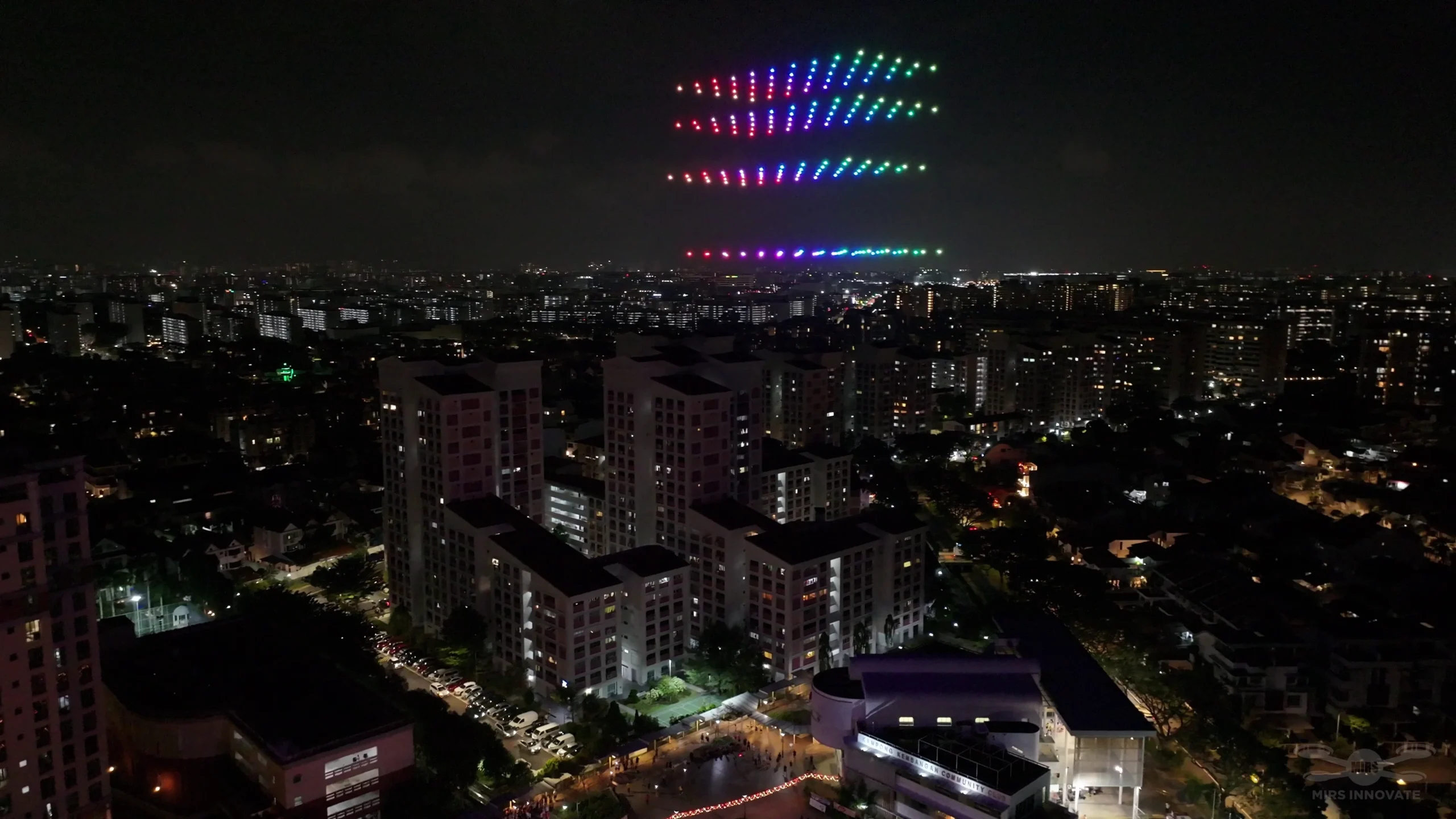 Rainbow drone waves above the Kampong Kembangan CC community celebration