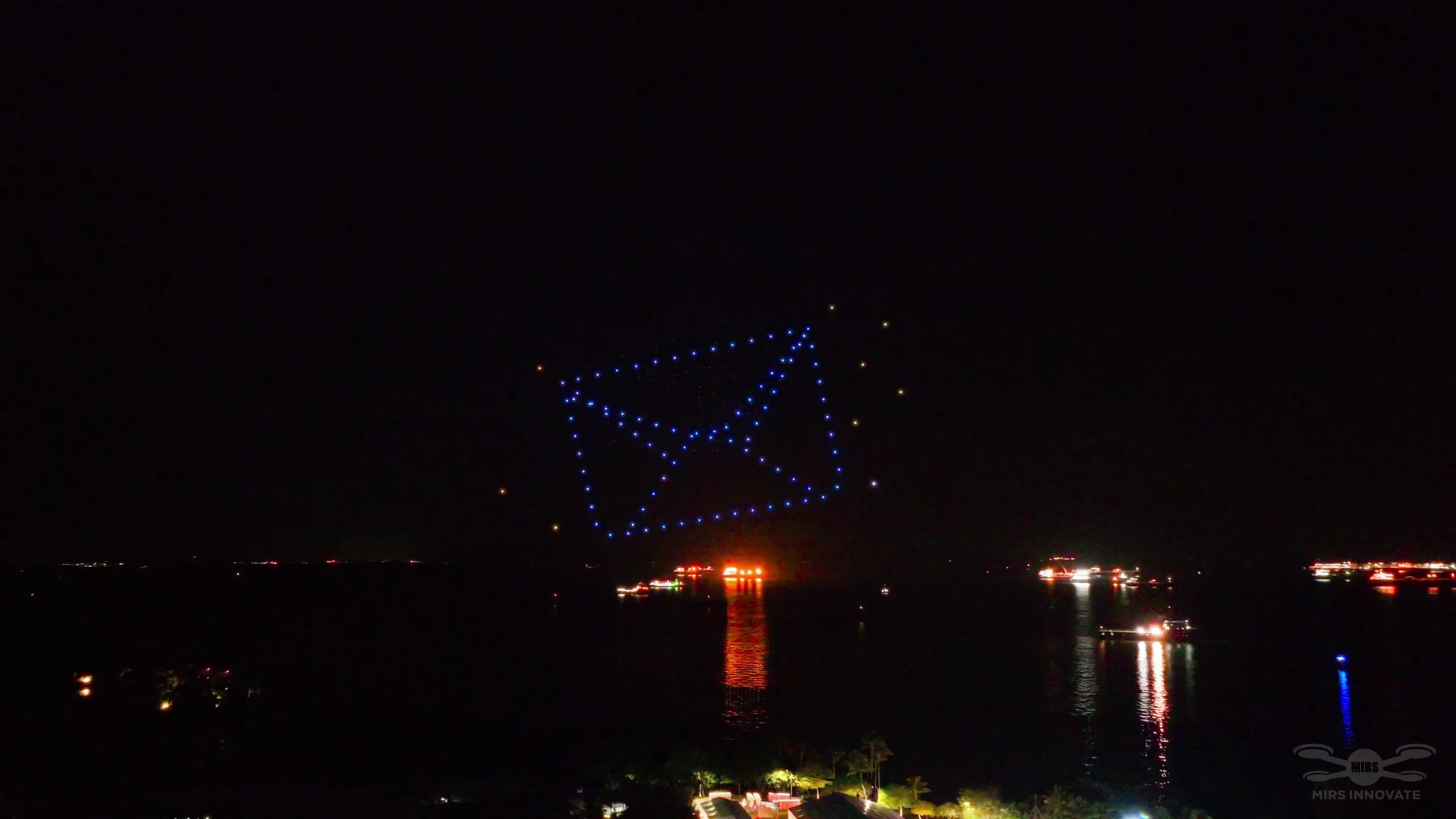 Envelope icon drone formation for a corporate brand event in Singapore