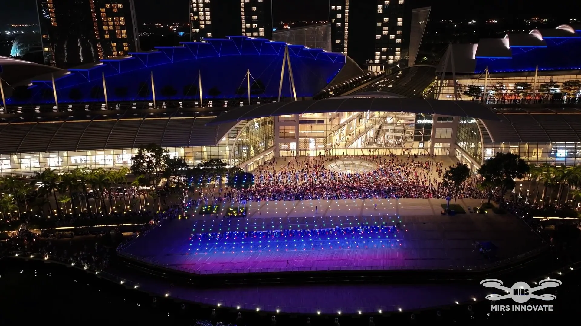 Blue launch grid and crowd at Marina Bay Sands for the SIEW exhibition drone show