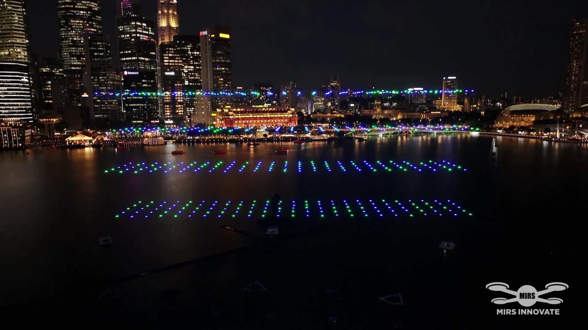 Night drone grid over Marina Bay for the SIEW exhibition drone show