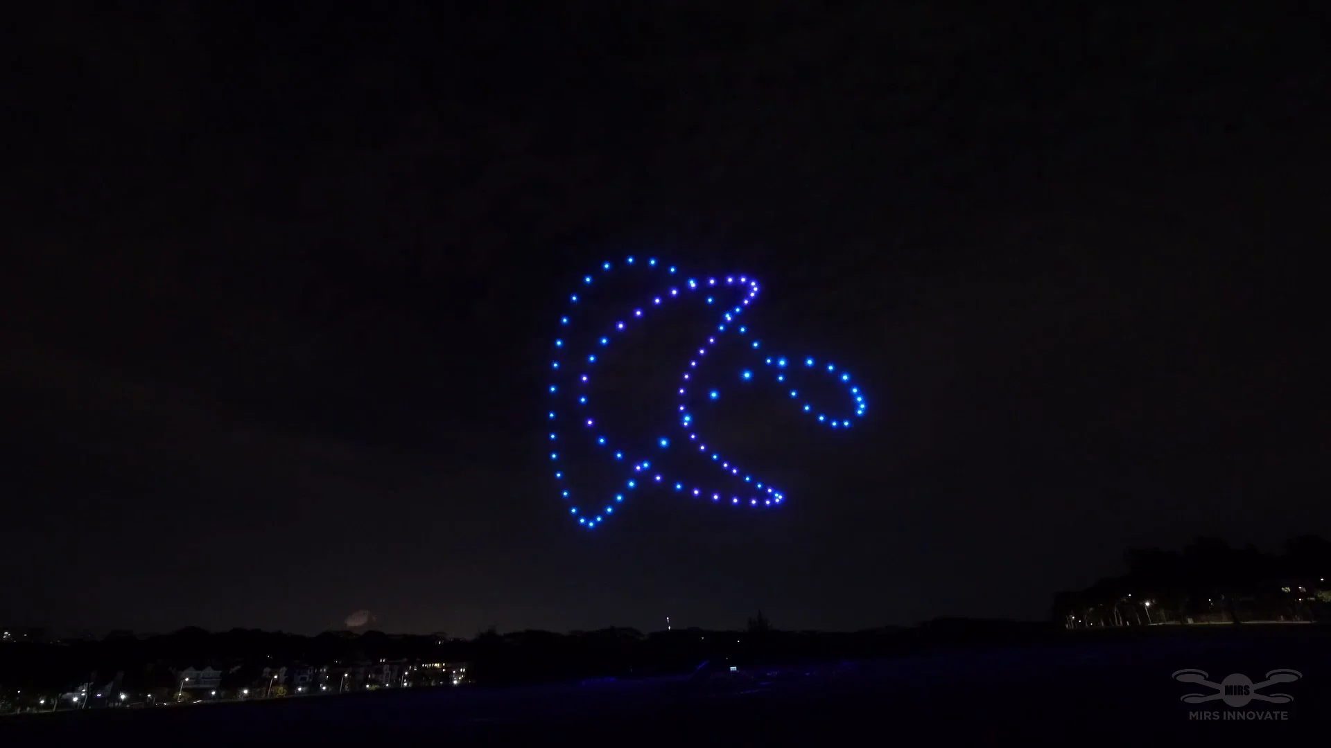 Blue heart outline formation in a Singapore wedding proposal drone show
