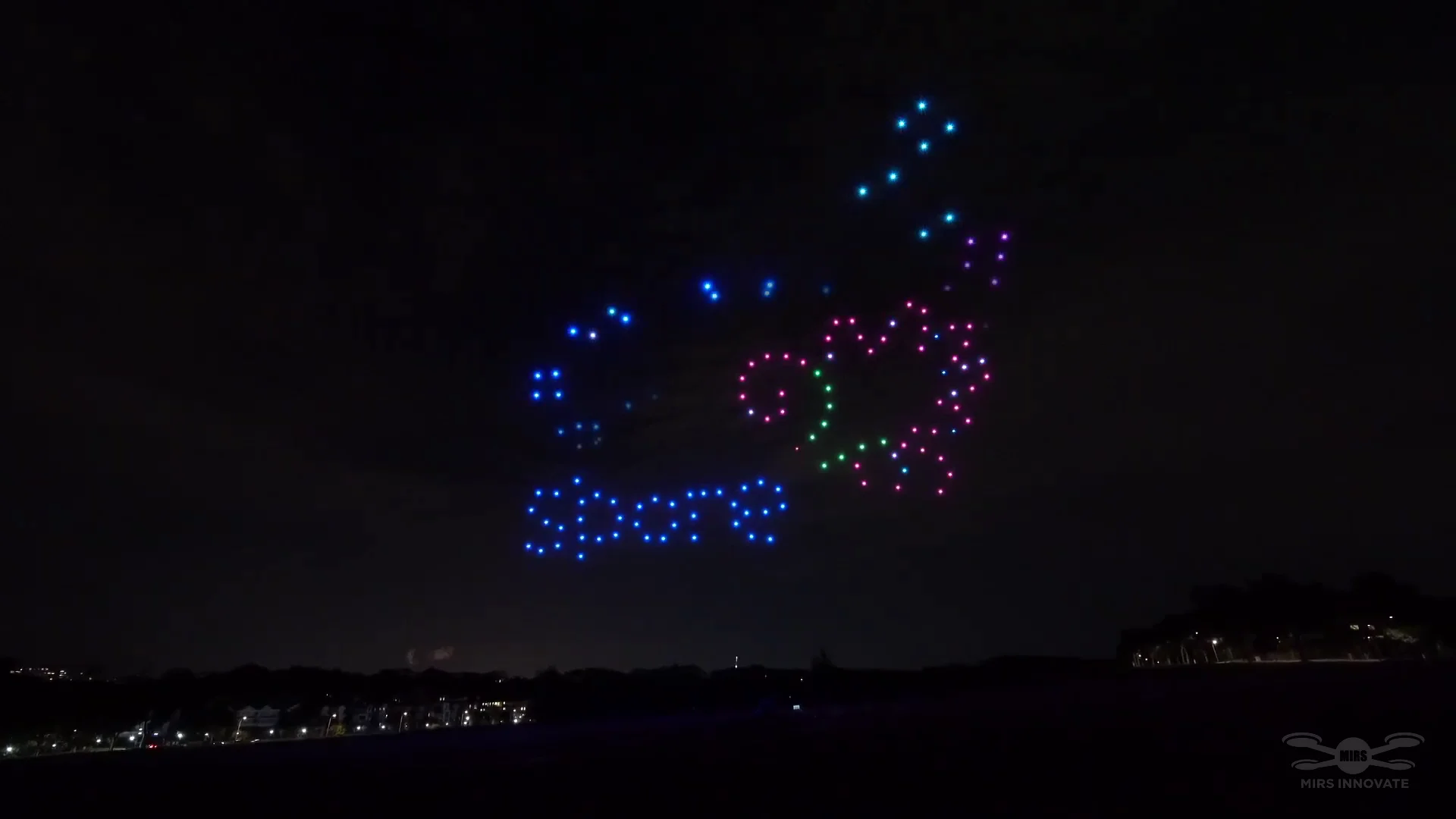 Multicolour heart and arrow drone formation in a wedding proposal sky-art sequence