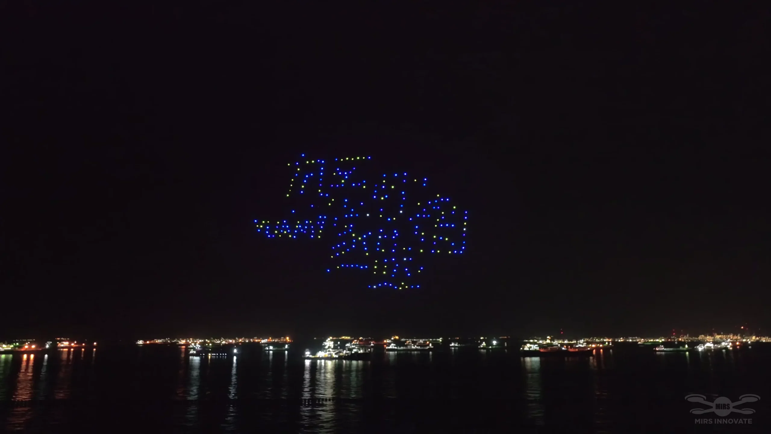 Blue and green Chinese character formation in the YuanYi 2025 drone show