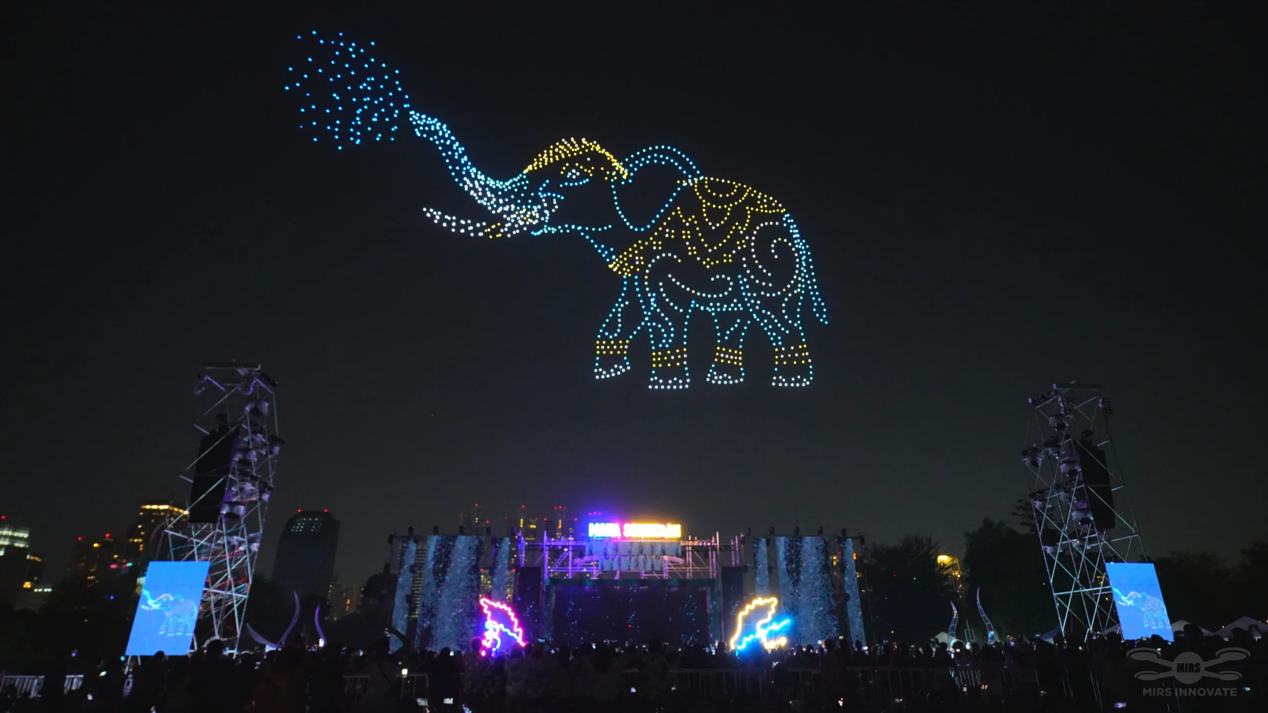 Elephant spraying water drone formation for a Songkran festival