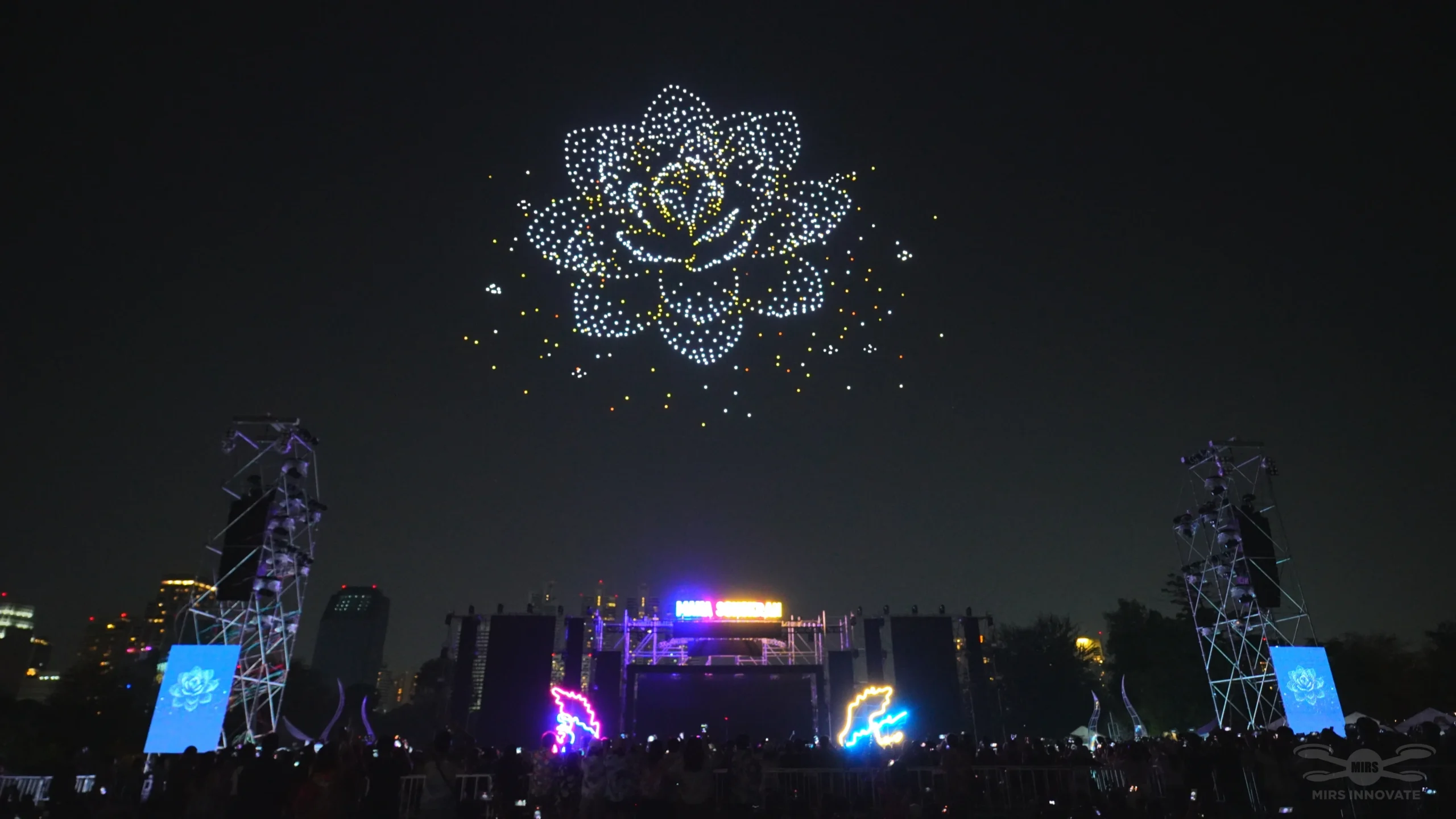 Flower drone formation above a Songkran festival stage