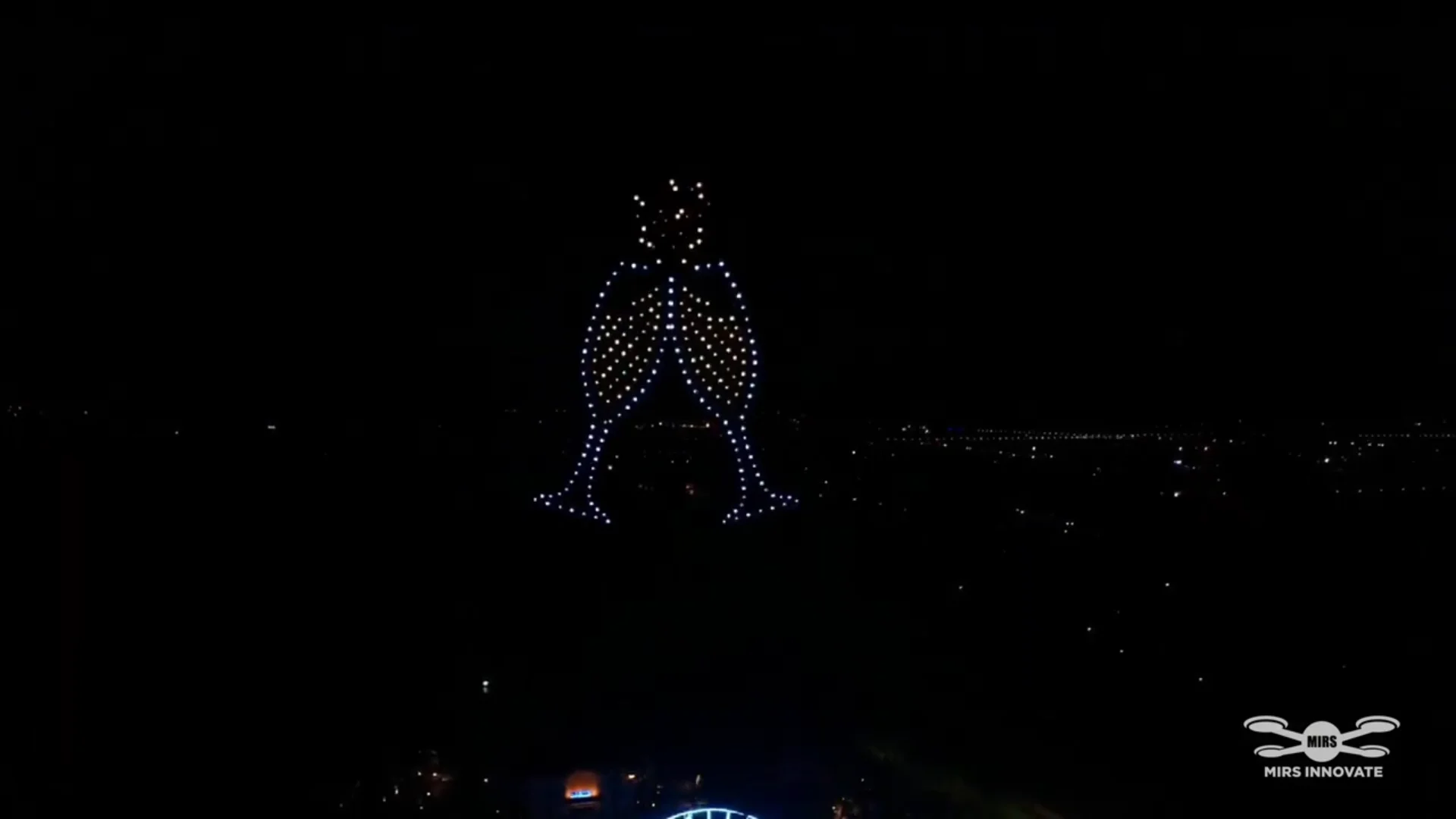 Champagne glasses celebration formation created by 600 drones in China
