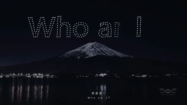 Who am I text formation above Mount Fuji at the Socrates app launch drone light show in Japan