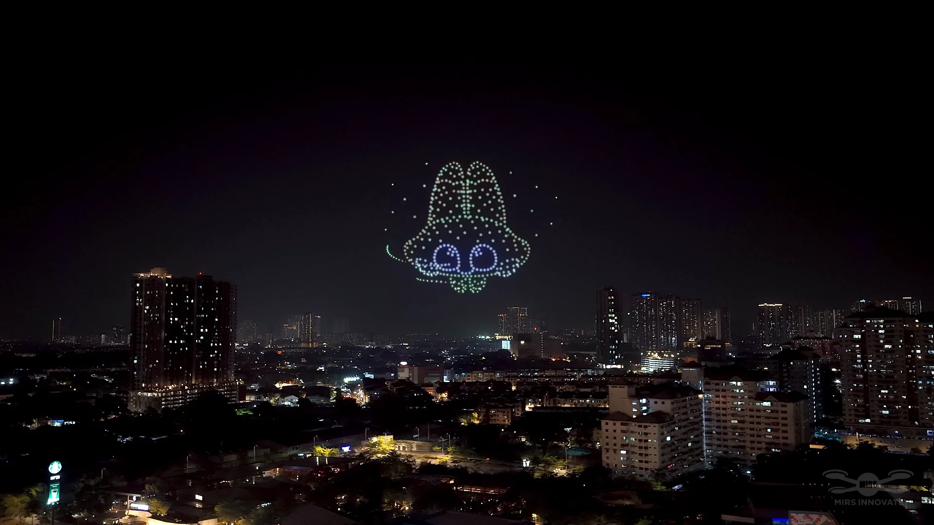 Luna mascot drone formation over the Kuala Lumpur skyline