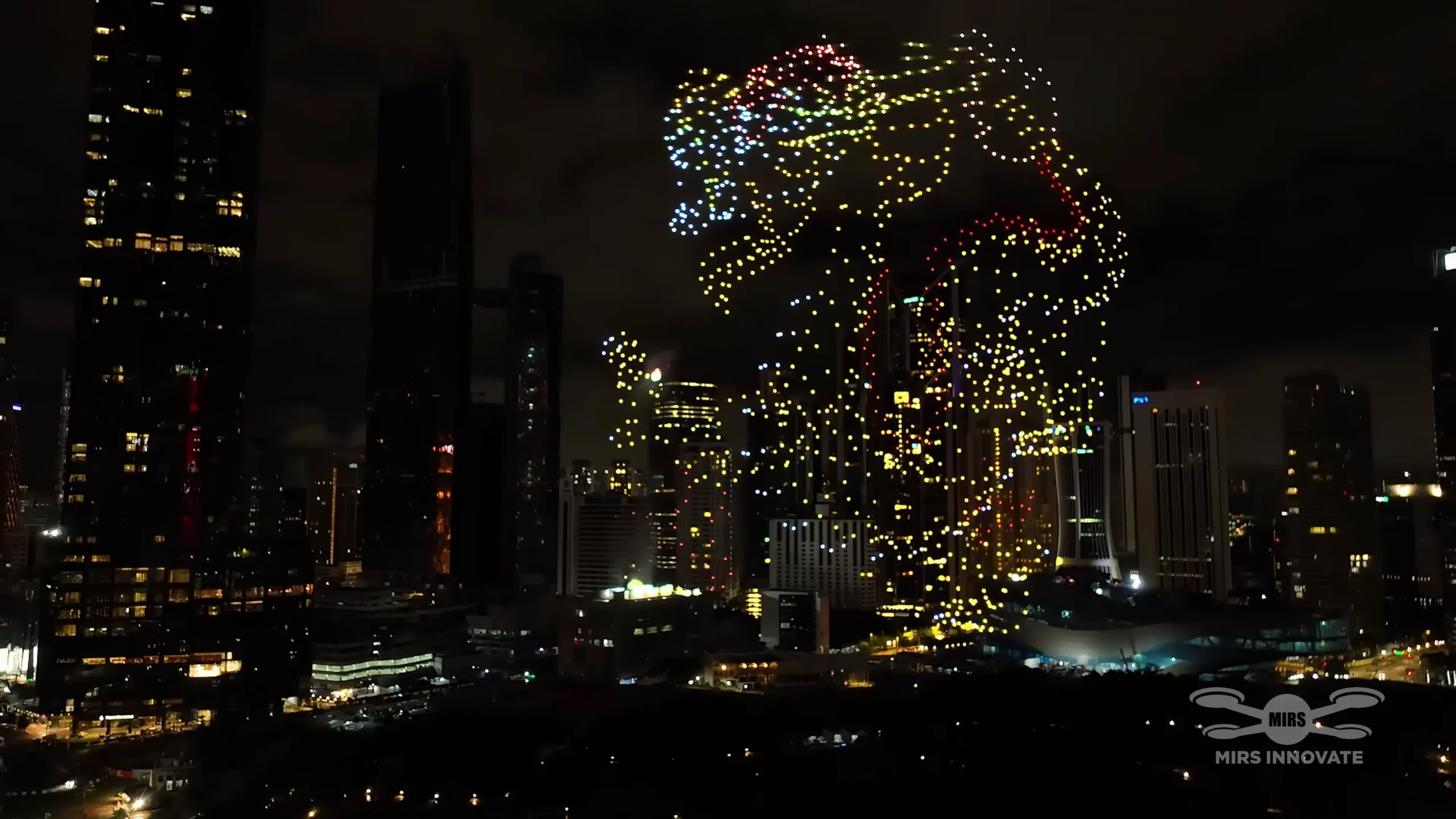 Golden lion dance formation above the Kuala Lumpur skyline at the 2025 Lunar New Year drone show in Malaysia