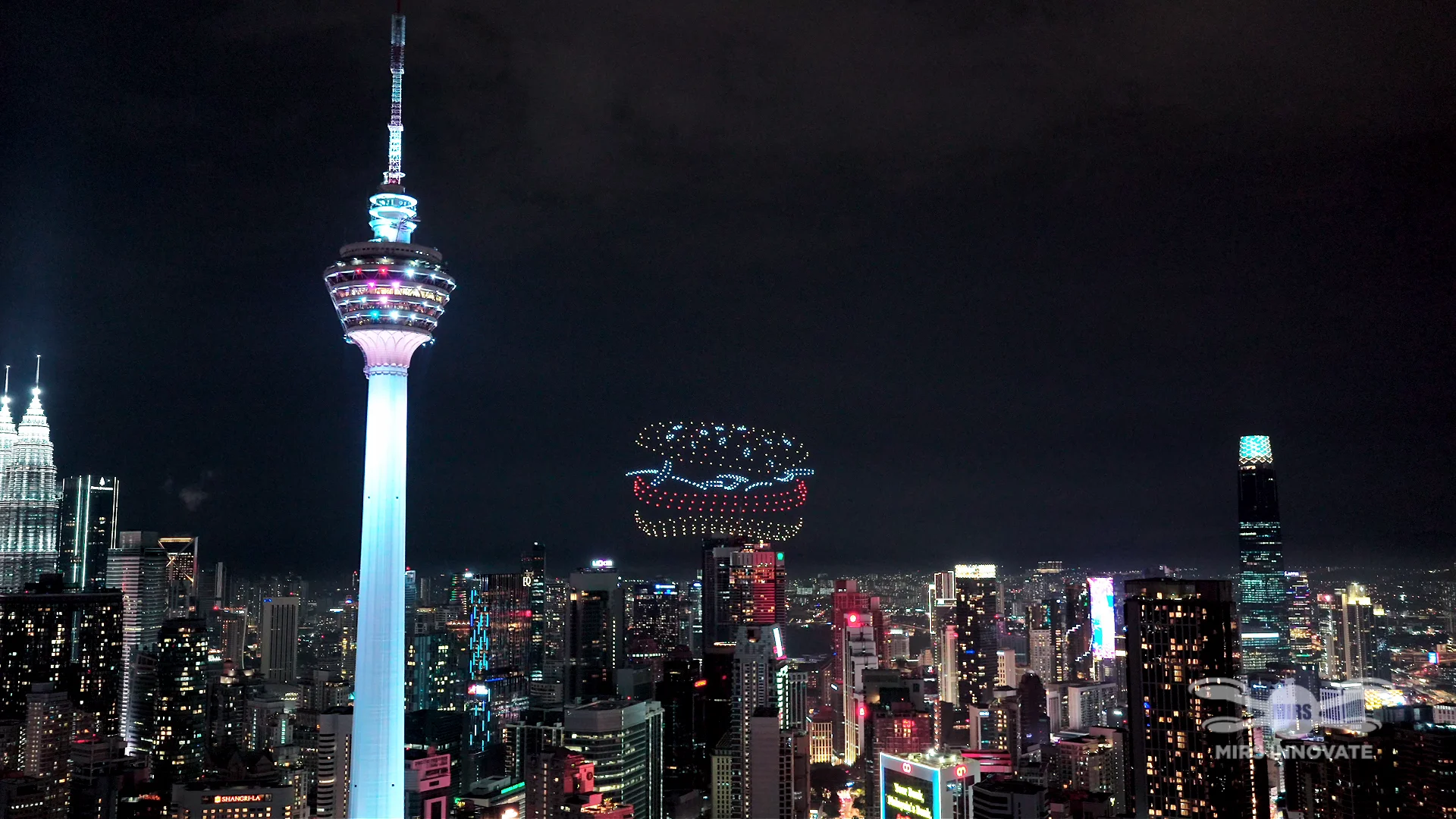 Prosperity Burger formation above the Kuala Lumpur skyline beside KL Tower at the McDonald's Malaysia drone show