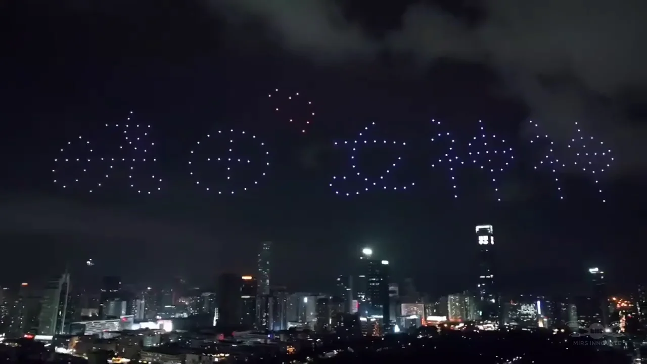 Romantic symbols and a heart formed by 200 drones above an overseas cityscape
