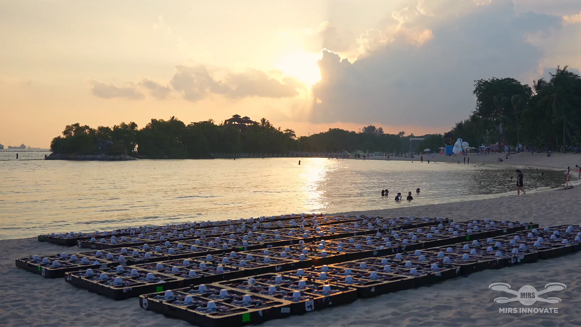 300-drone fleet prepared at sunset for a private family celebration at Palawan Sentosa Singapore