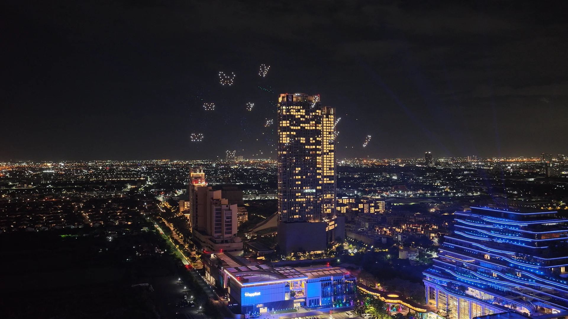 Butterfly drone formations representing Happitat's Butterfly Phenomenon concept