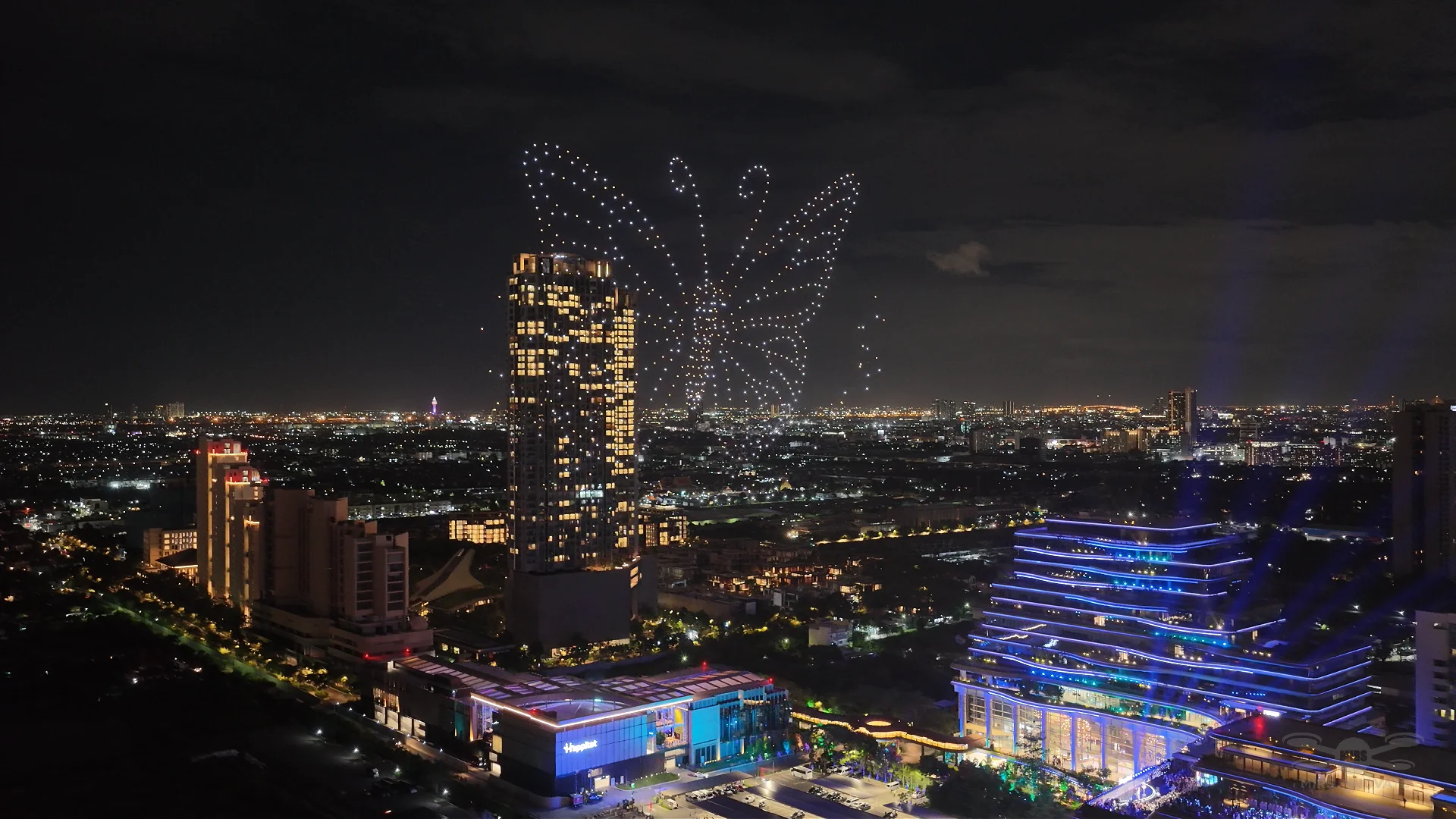 Large butterfly drone formation above Happitat during the Bangkok grand opening