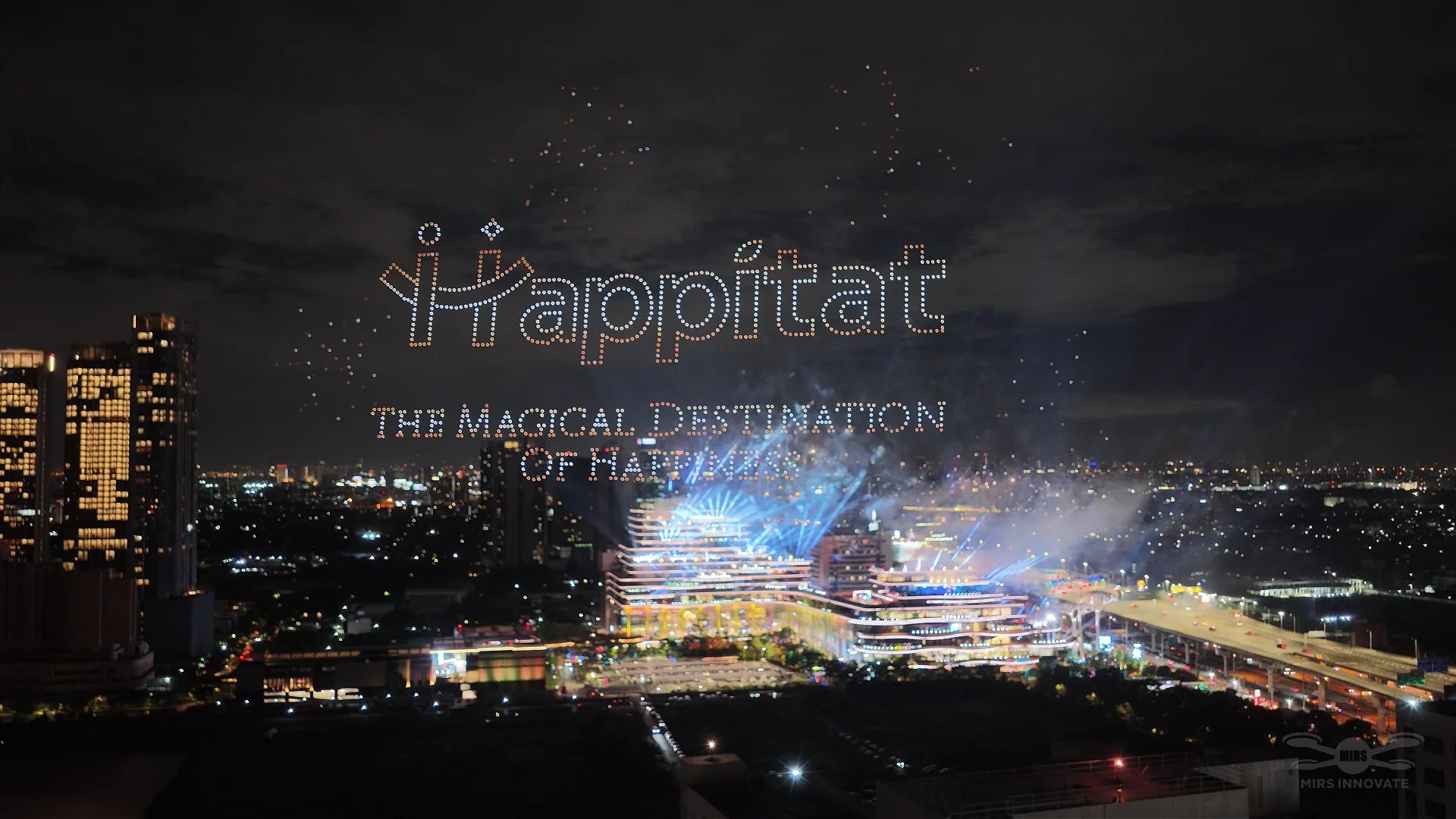 The Magical Destination of Happiness text formation above Happitat Bangkok